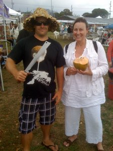 Wendy Chuck on Hawaii for The Descendants, with a coconut salesman. Photo courtesy: Wendy Chuck; Homepage photo: Merie Wallace