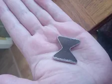 Roman Liubyi is handing out iron butterflies at the premiere.: 'It's made from the parts of a rocket that fell near the house of my parents'