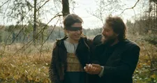 Agnes (Anja Plaschg) being led blindfolded by her husband Wolf (David Scheid) to where they will live