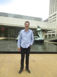 Antonin Baudry at Lincoln Center in sneakers gifted to him by Omar Sy: '"For some reason shoes, for me they're really a part of our identity. You can't escape that."