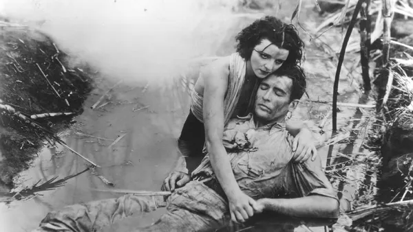 Actress Mona Maris and Actor David Newell in a production still from the 1934 film, White Heat, aka Cane Fire.