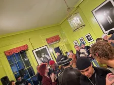 DJ Julio bottom left at the New York After Dark opening reception