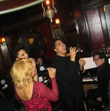 Darlene Love, Judith Hill and Lisa Fischer in perfect harmony at Peggy Siegal's holiday celebration