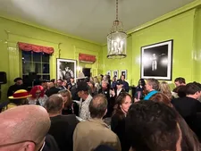 Dustin Pittman in the middle of the action at the lively opening reception at Eerdmans
