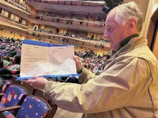 Ed Bahlman holding up the ESG setlist