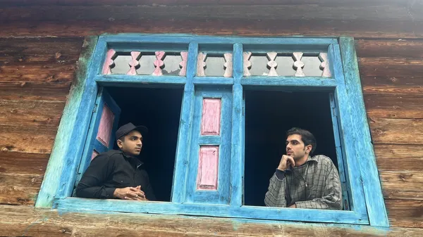 Akash Menon and Mir Tawseef as Karun and Faheem
