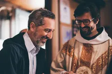 Gad Elmaleh with Father Barthélémy (Nicolas Port)