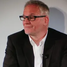 Cannes Film Festival artistic director Thierry Frémaux listening attentively to media questions at the press launch in Paris