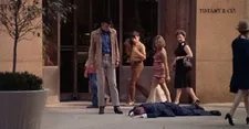 Joe Buck (Jon Voight) crosses paths with a body in front of Tiffany & Co.