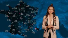 Patricia Coma (Julia Faure) forecasting dire weather in Coma