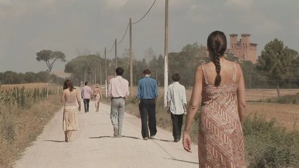 Walking to the castle in Unrelated: "Anna wears that looks like a maternity dress. It belonged to Kathryn Worth's mother."