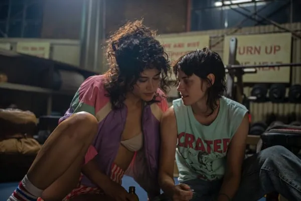 Katy O'Brian and Kristen Stewart as Jackie and Lou in Love Lies Bleeding. Olga Mill: 'Jackie catches Lou’s eye in every way. There’s her physicality, but also she's a brighter colour that comes into the world'
