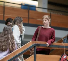 Ms Nowak (Leonie Benesch) on the stairs of the school