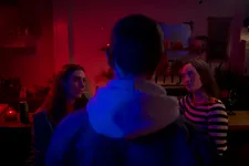 Lou and Wally are approached by a man