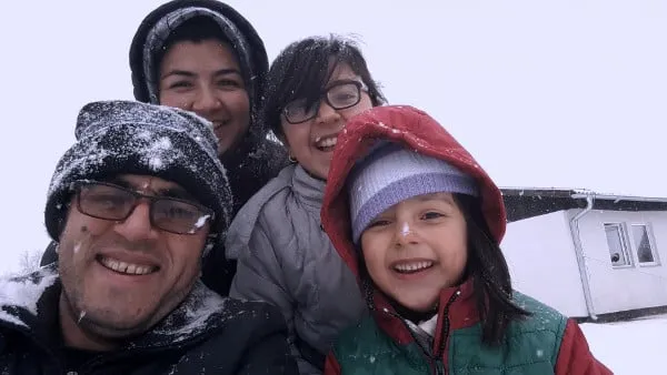 The Fazili family - Hassan Fazili, Fatima Hussaini and daughters Nargis and Zahra at the Krnjaca refugee camp in Serbia. Producer Su Kim: 'I think what does come through is that this is a normal family, who you can relate to and who is going through something really trying and difficult'