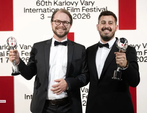 Mads Mengel, left, and producer Victor Cunha at the closing awards ceremony at the Karlovy Vary International Film Festival with best director and special jury prize awards