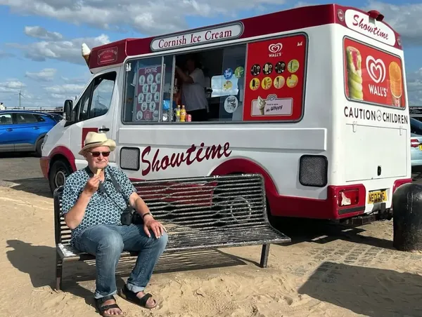 Martin Parr takes and ice-cream break. Lee Schulman: 'When we were making the documentary, we kept losing him all the time.. he is a sort of Mr Everyman'