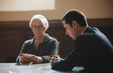 François Ozon on Régine Maire (Martine Erhel) with Alexandre (Melvil Poupaud): “She is part of the institution. But she thinks she does her best.”