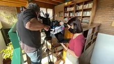 Maite Alberdi with cinematographer Pablo Valdés filming The Eternal Memory