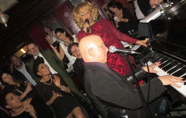 Paul Shaffer accompanying Darlene Love in "Christmas (Baby Please Come Home)" as the holiday revelers join in.