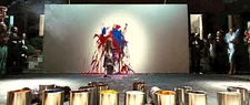 Francesca Amodio as Carmelina, executing a divorce party rage painting.