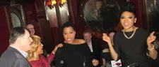 Richard Kind caroling with Darlene Love, Lisa Fischer and Judith Hill.