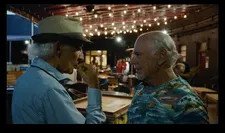 Ron Delsener making plans with Jimmy Buffett