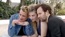 Fooling around for the Cannes photographers in 2024, from left: Pierre Cottin, Sarah Suco and Benjamin Lavernhe at the premiere of The Marching Band