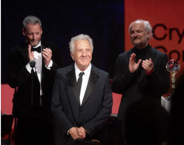 Dustin Hoffman on stage with festival director Karel Och, right, and executive director Krystof Much