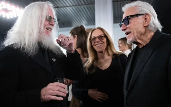 Harvey Keitel met 'big bad Bob' Richardson when he was presented with a Crystal Globe award. Centre Keitel’s wife Daphne Kastner
