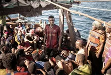Seydou (Seydou Sarr), the captain on the boat