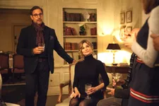 Ted Swenson (Stanley Tucci) with his wife Sherrie (Kyra Sedgwick) at a faculty party