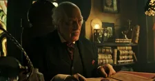Clancy Brown as mortician Montgomery Dark