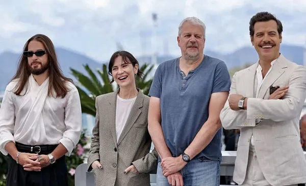 Photo call in Cannes for the team from Sylvain Chomet’s The Magnificent Life, from left: French rapper SCH who sings the theme song; with voice cast of Géradline Pailhas and Laurent Lafitte flanking the director