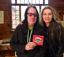Todd Rundgren holding up the Fanny Walked The Earth CD with Bobbi Jo Hart