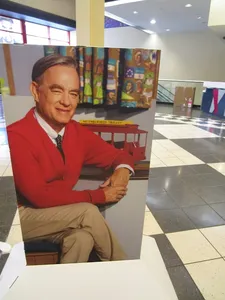 Tom Hanks with the Mister Rogers’ Neighborhood trolley in A Beautiful Day In The Neighborhood