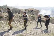 Abdoul, her interpreter (Tristan Sadeghi) leads the way for France (Léa Seydoux), Lolo (Marc Bettinelli), and her cameraman