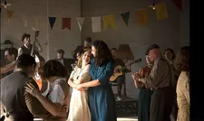 Ginia (Yile Yara Vianello) dancing with Amelia (Deva Cassel)