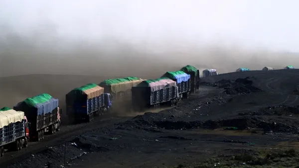 Khoroldorj Choijoovanchig on his inspiration for Colors Of White Rock: I was flying a drone and I thought this image of trucks lining up towards the border looked like a giant iron snake
