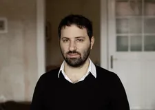 Israeli director Ofir Raul Graizer whose The Cakemaker won the Ecumenical Prize for its "journey towards acceptance and the pursuit of love.”