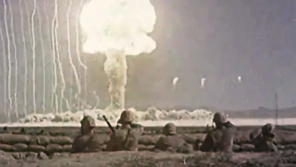Soldiers in a trench witness an atomic test in Our Planet, The People, My Blood