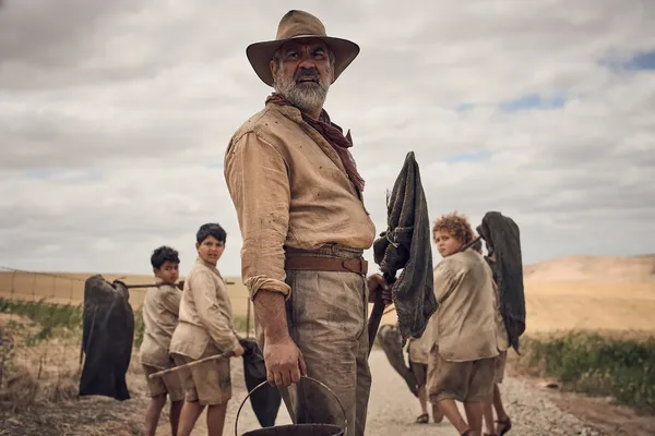 Wayne Blair as George, with some of the young cast. Warwick Thornton: 'I was completely naive to that theory, don’t work with animals or kids. But we survived it. They're amazing'
